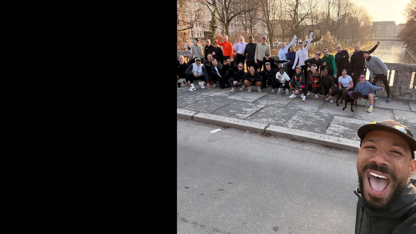 Ben Olayinka taking a selfie with a RUN-N-RAVE group in Berlin